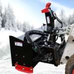 Hgih flow messer snow blower attachment on skid loader left back view with connections by messer attachments