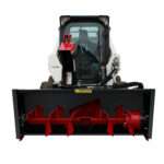 Snowblower attachment front view on skid loader, ultra high flow